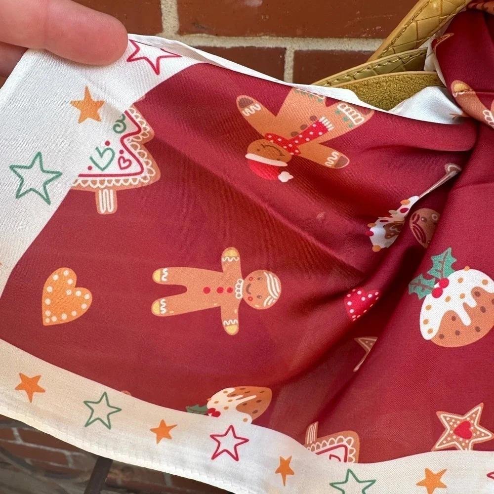Stylish Red and White holiday scarf. 21.6 x 21.6 gingerbread men